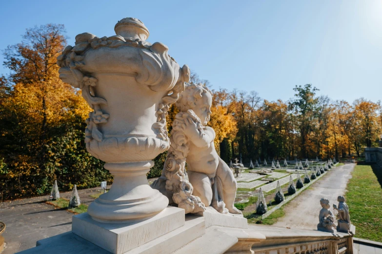 statues of two elephants and an animal are shown