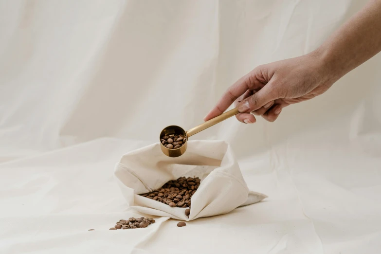 there is a cup of coffee inside a bag