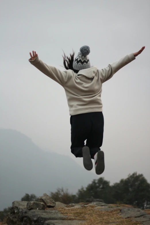 a man is jumping high into the air