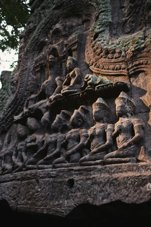 stone carvings adorn the facade of a building