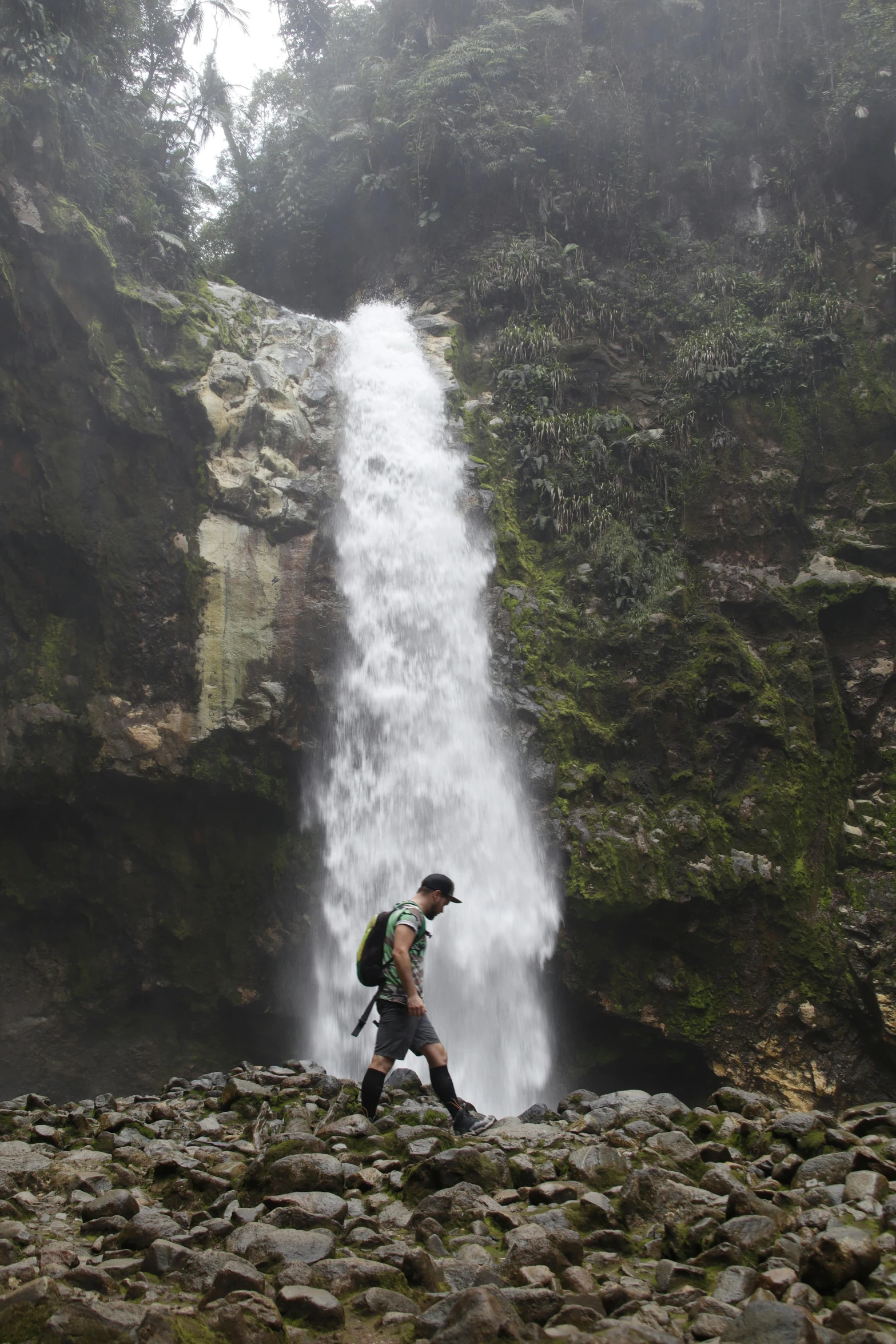 the hikers are following through the small waterfall