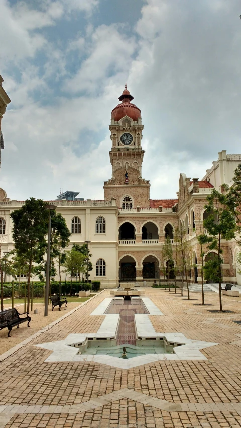 a large building with a clock tower in the middle