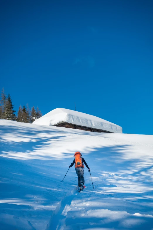 a person skiing down a mountain covered in snow