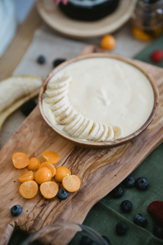 an image of food on a board with fruits