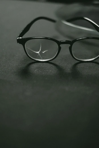 an image of glasses resting on a table