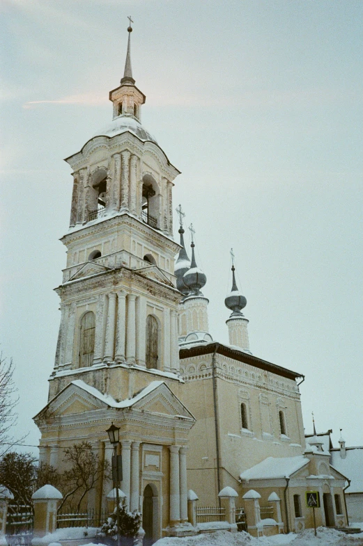 the church building has steeples and spires all around it