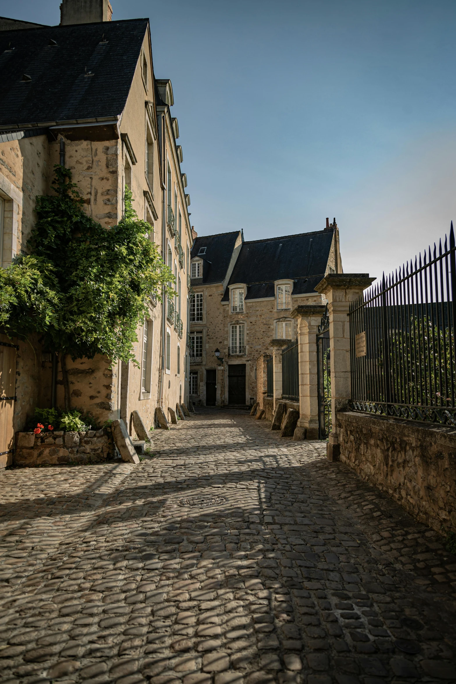 there is a brick street in an old european town