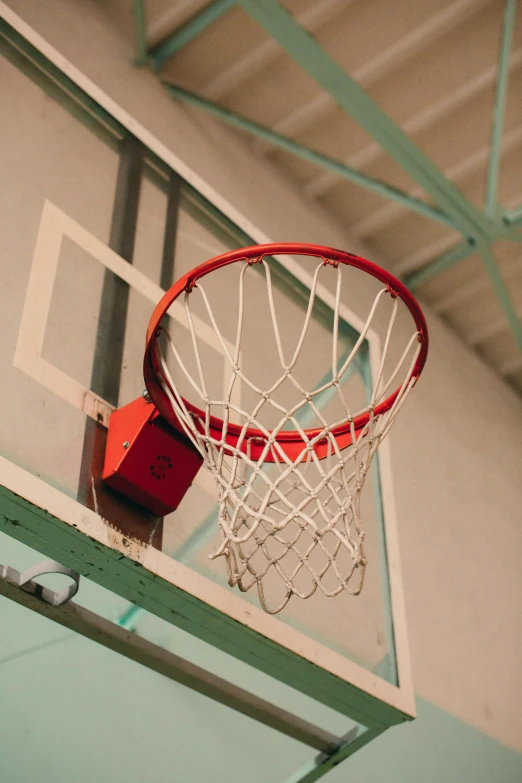 an image of a basketball hoop going through the net
