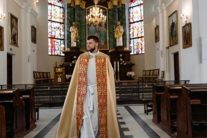 a man dressed as a priest in front of an altar