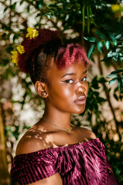 young african american woman in red off shoulder dress