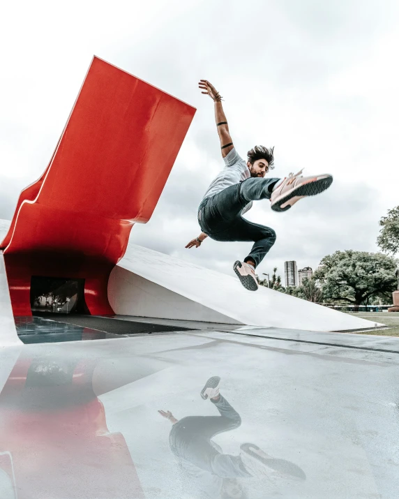 a man is on his skateboard doing a trick