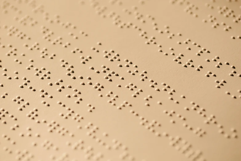 some small dots placed on a surface in beige