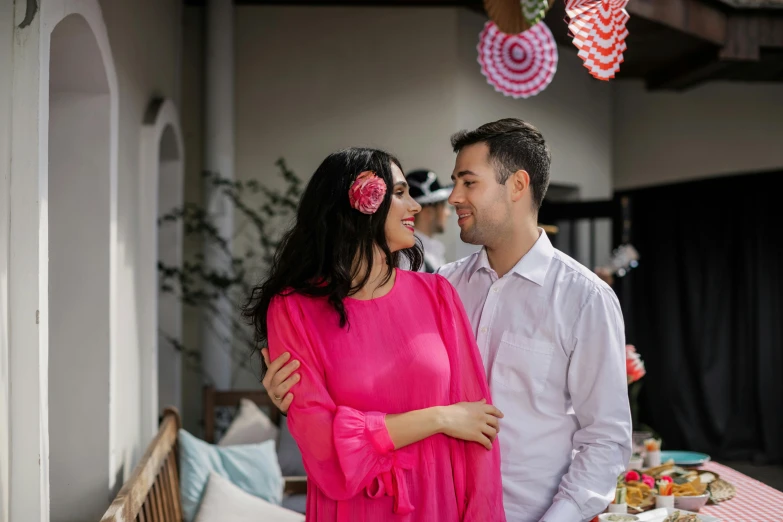 couple standing close together during an outdoor food tasting