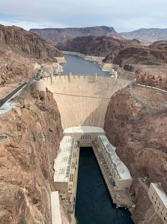 a dam with a lake in the middle