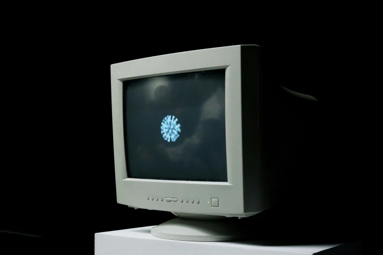 an old computer monitor with the screen up