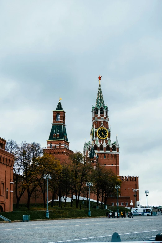 a large building with two towers and clocks