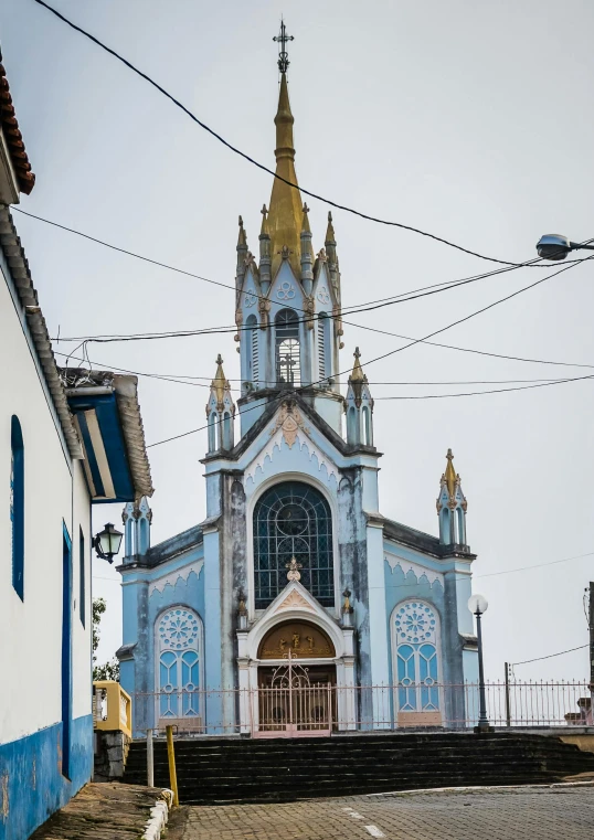 a building with many blue and white designs on the front