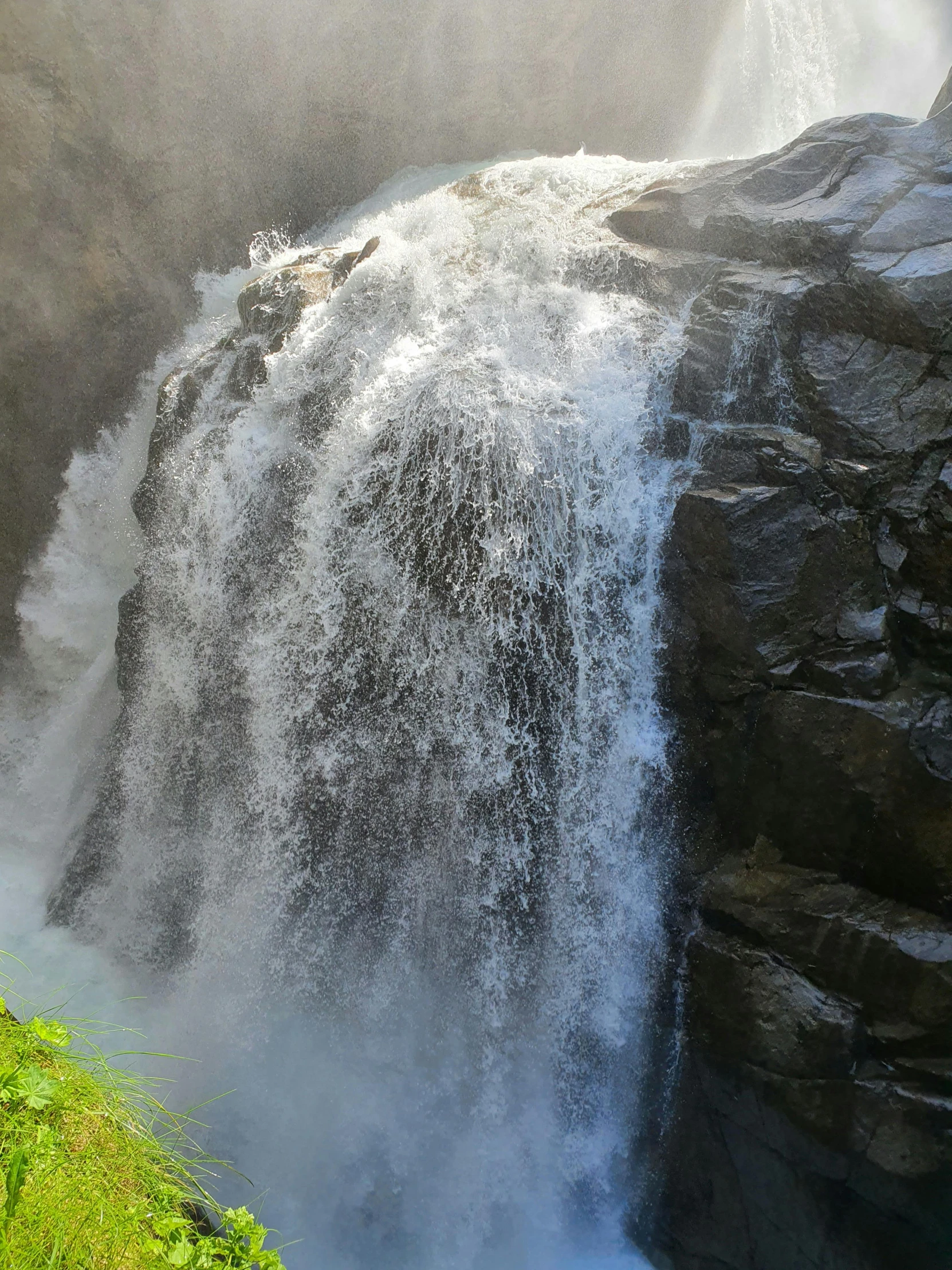 the view from below is showing a waterfall