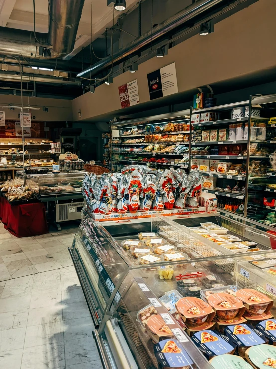 the food section of a store where you can find cakes