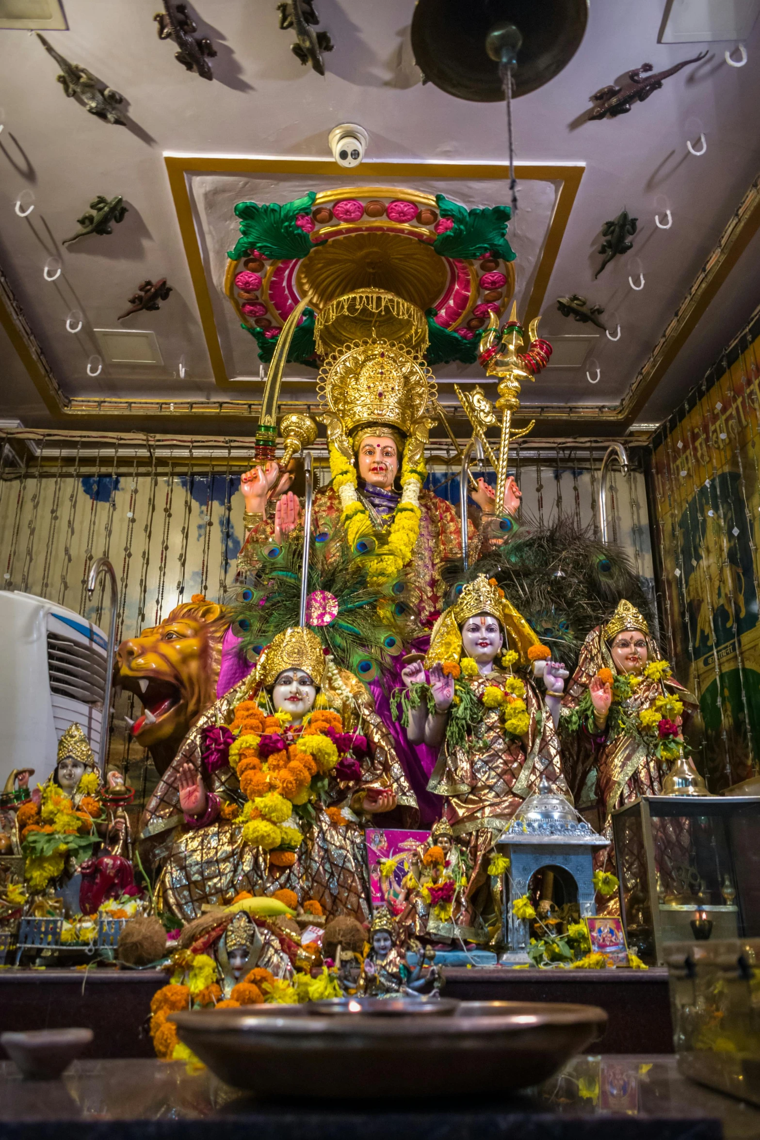 some colorful sculptures and decorations inside a building