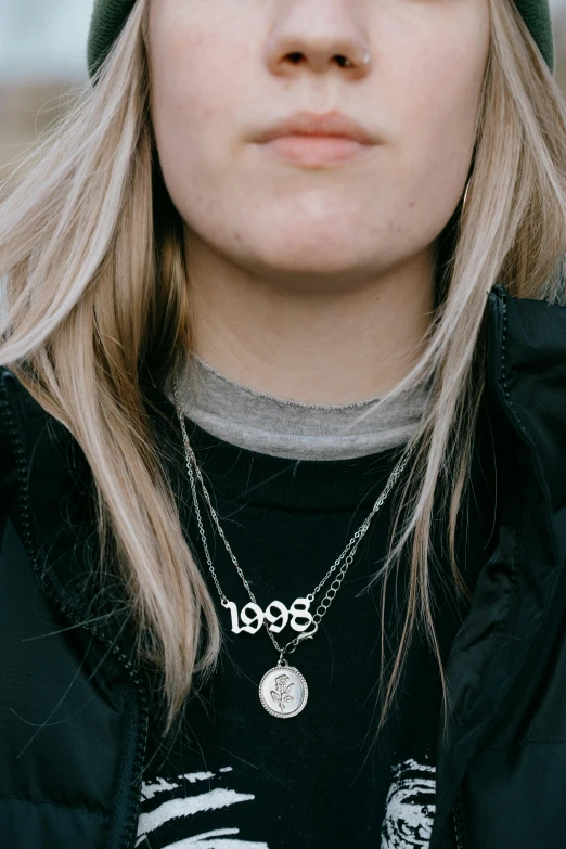 a girl with long blond hair and a beanie