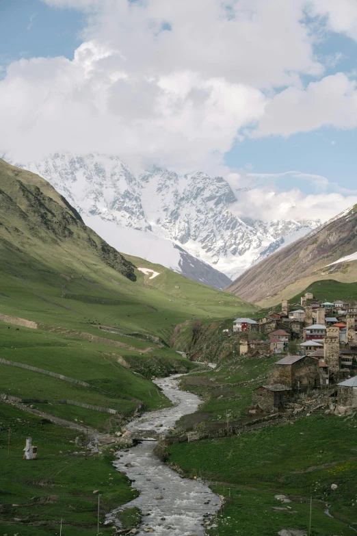 a small mountain village nestled near a stream