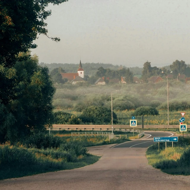 a view of an overpass leading to some hills