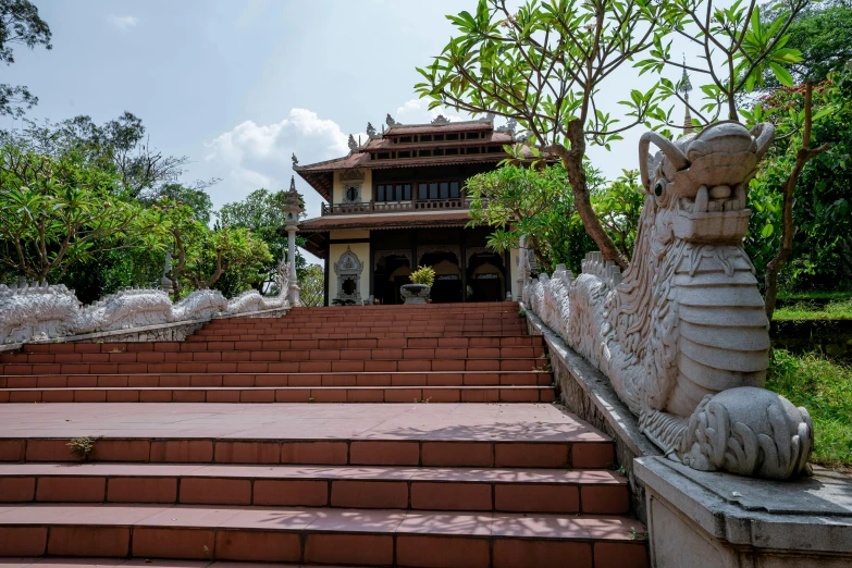 the stairs are made of brick and lead to the house