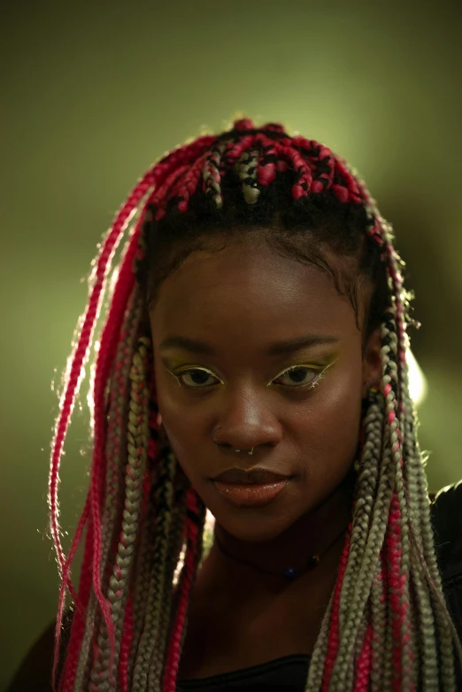 a girl with dreadlocks and a black shirt