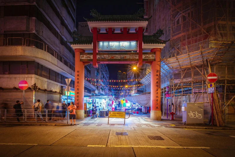 an archway in an asian building at night