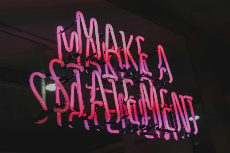 there is a neon sign that says i am making a strange thing