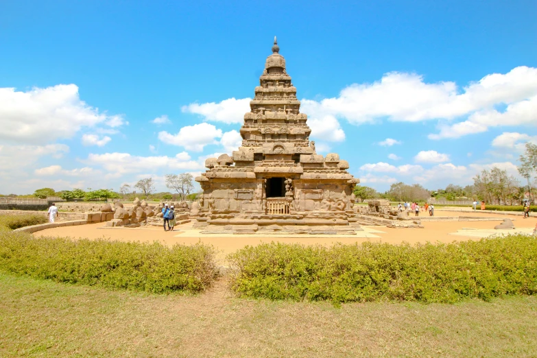 a beautiful stone structure in a park setting