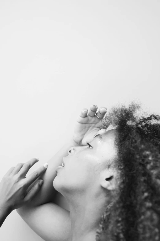 an image of a woman with dreadlocks doing soing