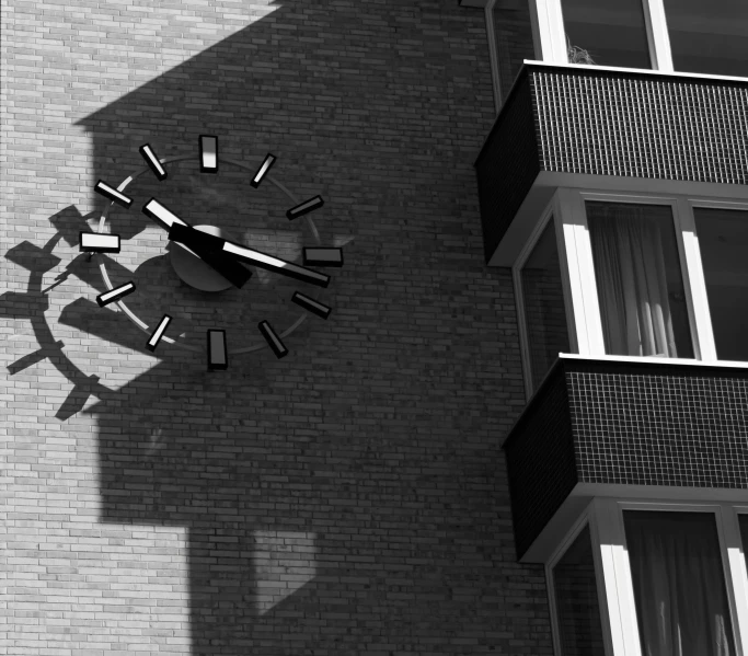 a clock that is next to a building