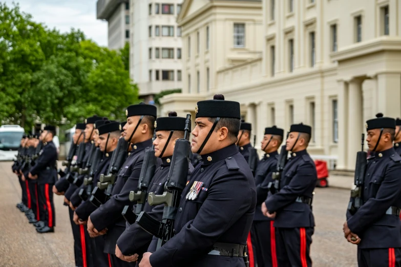 a group of men standing next to each other in military uniforms