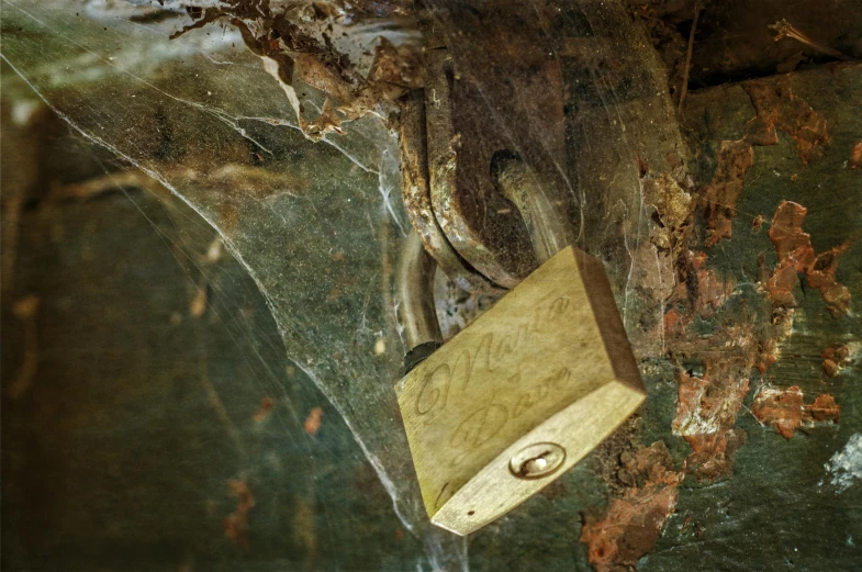 the corner of an old door with a metal handle