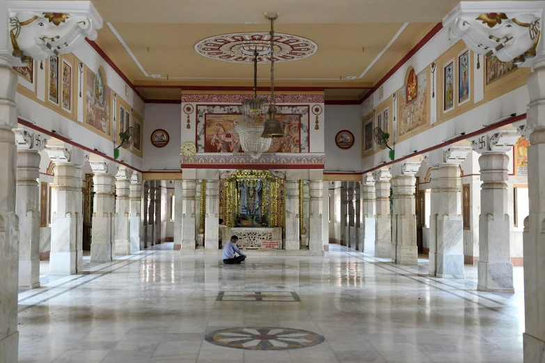 a cathedral with white marble floors and arches