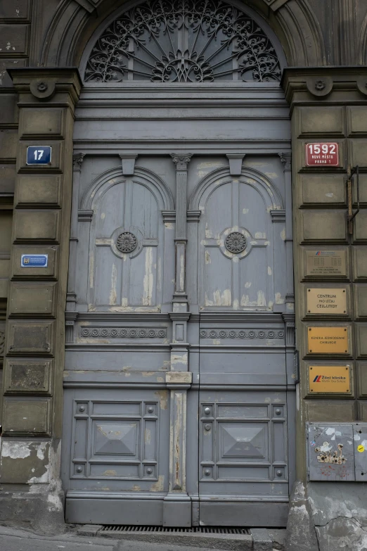 a couple of doorways on a stone building