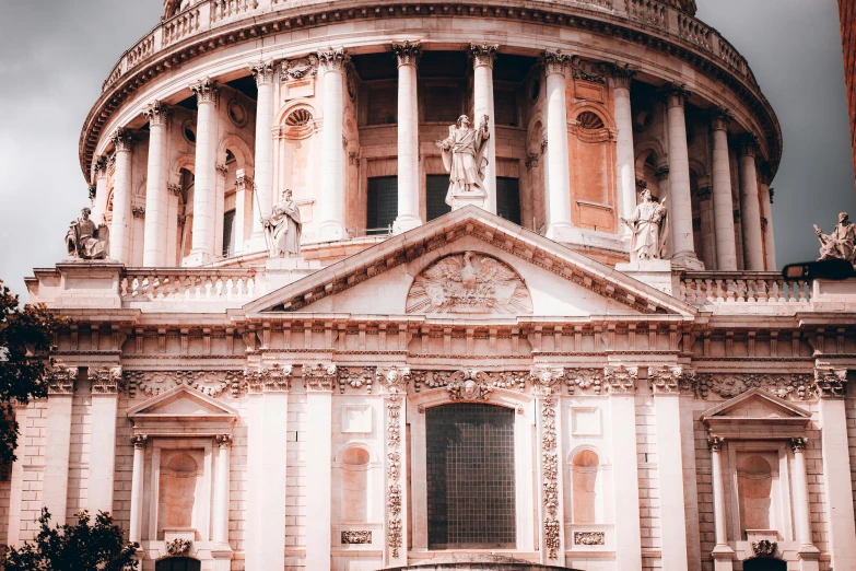 the dome of a very old building with a statue