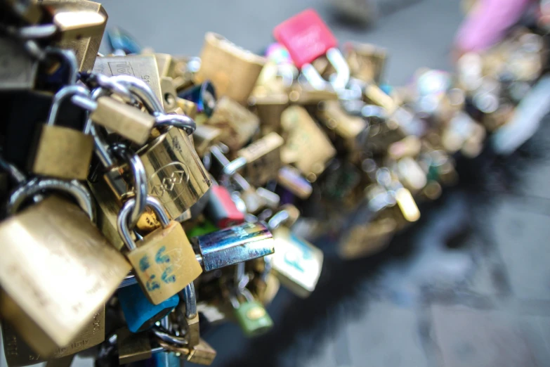 some padlocks connected to each other on a bridge