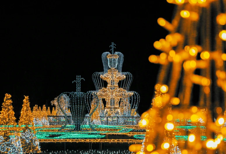 a christmas scene is shown with a large light display