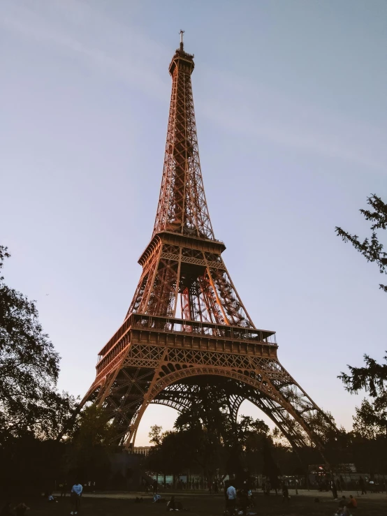 a very tall, metal tower in the city