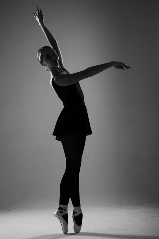 a woman dancing in the middle of a room