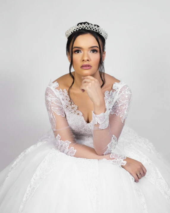 a beautiful woman wearing a wedding dress and veil