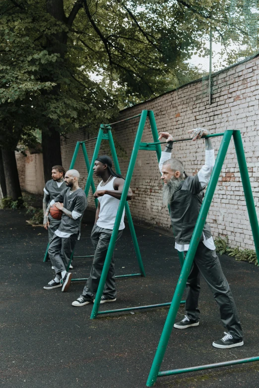 the s are playing in the gym on the swings