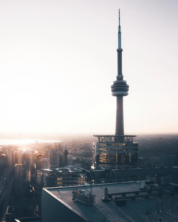 an aerial view of a building with a tower