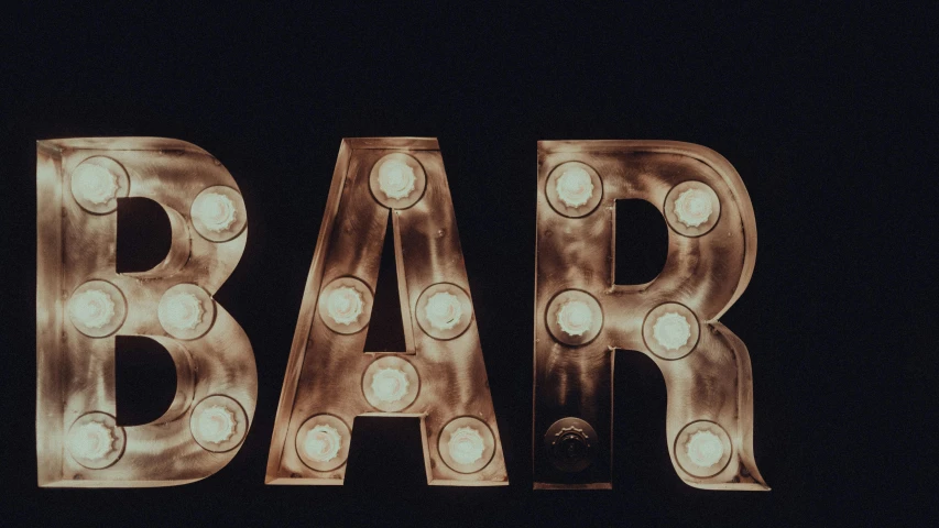the illuminated sign is made up of letters with lights