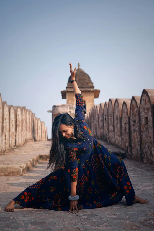 a young woman stretching out on the street