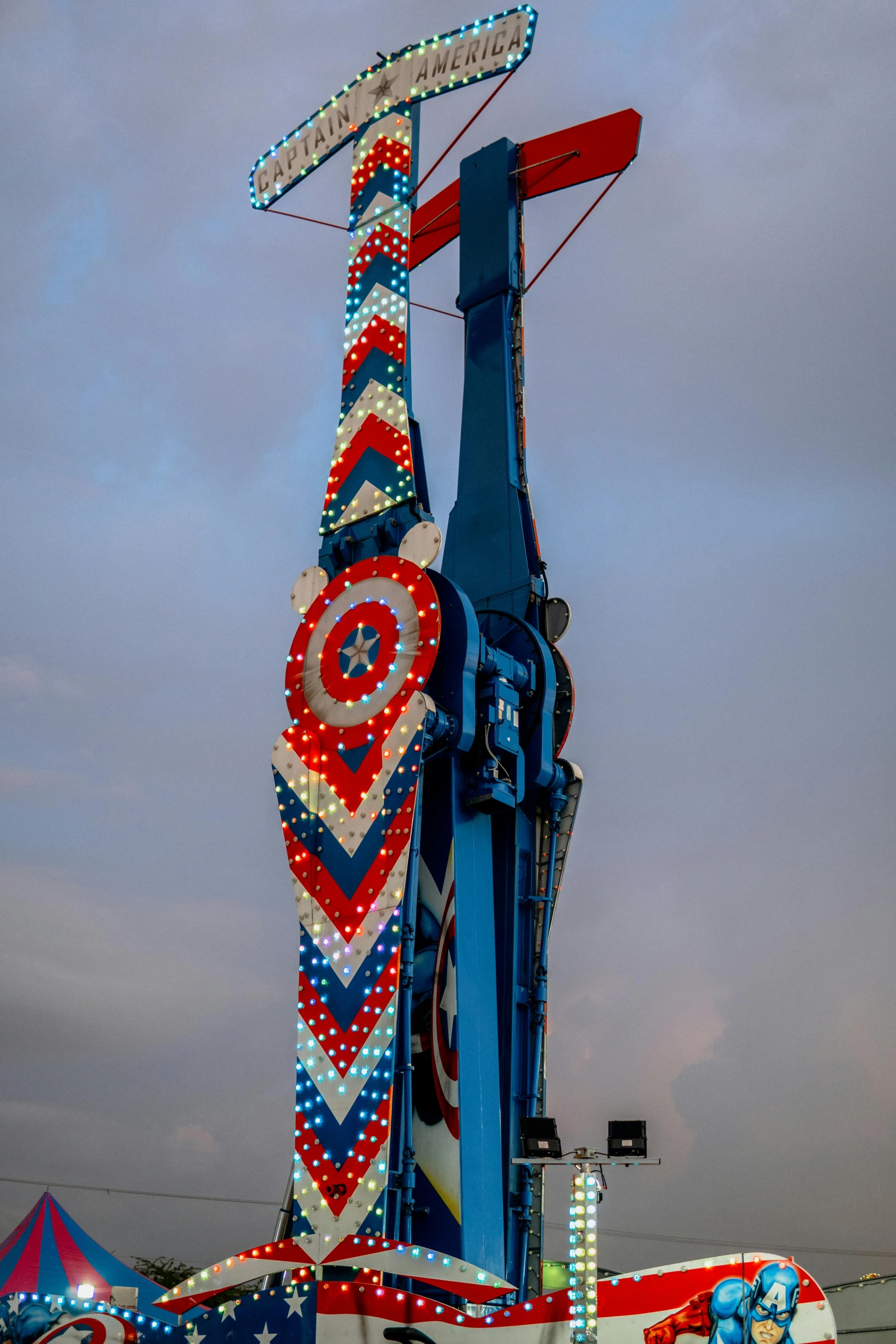 an old circus ride in the middle of a field