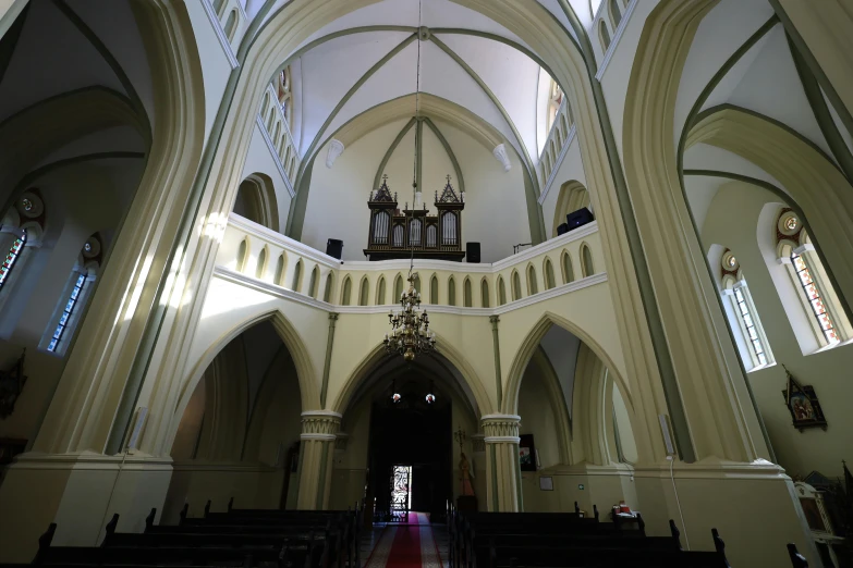 the inside of an ornate building with many windows